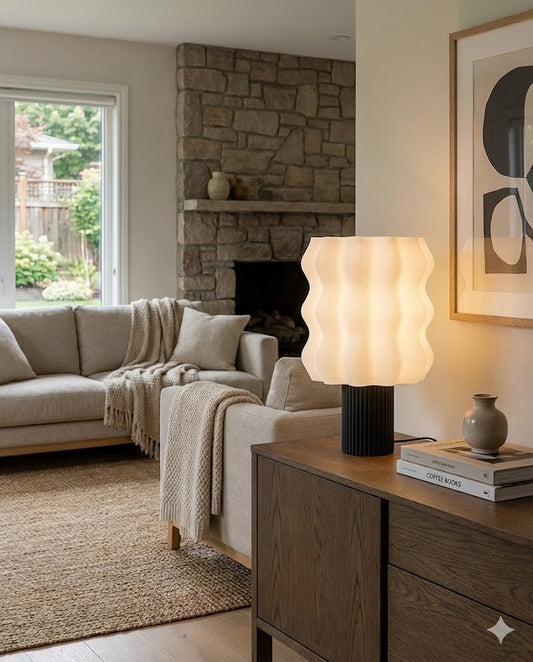 Sculptural wavy 3D printed table lamp in a modern living room, showing detailed ribbed texture and warm LED lighting.